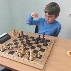В семейном шахматном турнире участвуют 19 команд